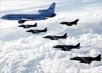 ATTENTION EDITORS REPEATING ADDING RESTRICTION - British Royal Air Force Tornados and Harrier GR7s fly in formaton with a Tristar tanker in this file photo dated July 2002. British GR7 Harriers have today, March 27, 2003, started for the first time during the conflct to refuel in the air (tanking) over Iraq enabling them to spend longer over their targets and travel further to targets. (EDITORIAL USE ONLY) REUTERS/Royal Air Force/Crown Copyrigh
