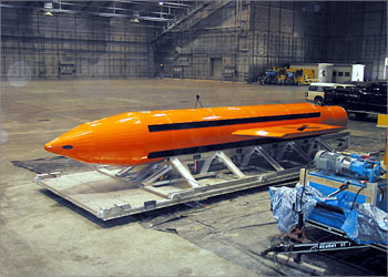 A Massive Ordnance Air Blast (MOAB) weapon is prepared for testing at the Eglin Air Force Armament Center on March 11, 2003. The U.S. Air Force successfully tested the most powerful conventional bomb in its arsenal on March 11, 2003, sending a mushroom cloud billowing into the sky over its Florida test range. It was the first test of the 21,000-pound (9,450-kg) MOAB explosive device nicknamed the "mother of all bombs." REUTERS/Depatment of Defense