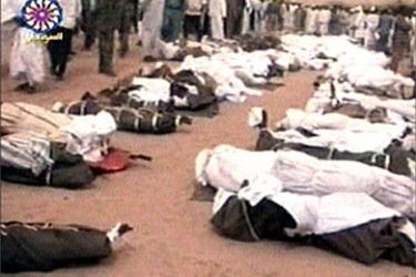 r - Video grab image shows bodies laid out from a Sudan Airways plane which crashed on a domestic flight, July 8, 2003. The pilot of the Boeing 737 reported a technical failure a few