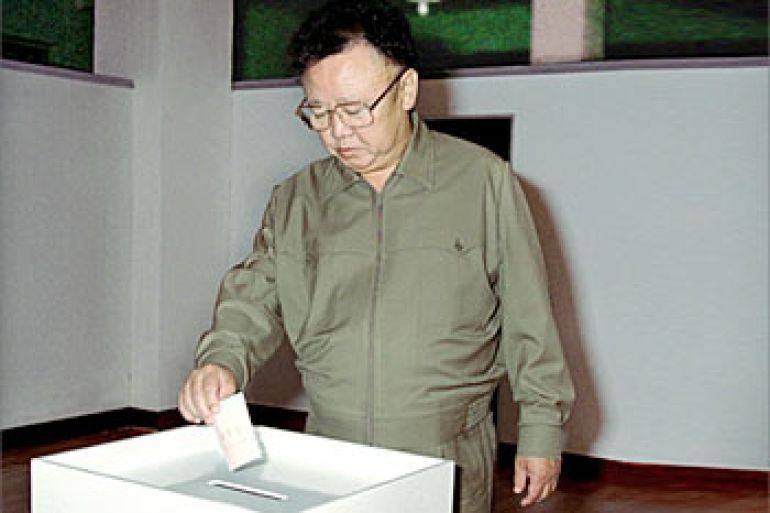 North Korean leader Kim Jong-il casts a ballot at Kim Il-sung Military University in Pyongyang August 3, 2003. Stalinist North Korea staged its first general election in more than five years on Sunday to fill seats in the rubber-stamp legislature, the Supreme People's Assembly. JAPAN OUT, NO ARCHIVES, NO SALES REUTERS/KNS