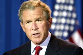 U.S. President George W. Bush makes a statement reacting to the bombing of U.N. headquarters in Baghdad, from his ranch in Crawford, Texas, August 19, 2003. Bush condemned a massive truck bombing that ripped through the compound and vowed: "The civilized world will not be intimidated." REUTERS/Rick Wilking