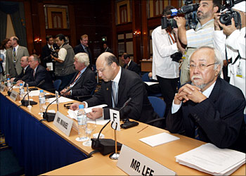 Delgates gather at the International Monetary and Financial Committee Meeting 21 September 2003, at the Dubai Annual Meeting of Board of Governors, World Bank Group and International Monetary