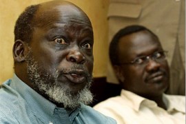 f: John Garang (R) leader of Sudan People's Liberation Movement/Army talks during a press briefing next to his deputy Riek Machar after his arrival in Nairobi, 04 September 2003 for talks between Khartoum and SPLA rebels.