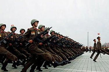 r / North Korean soldiers parade to mark the