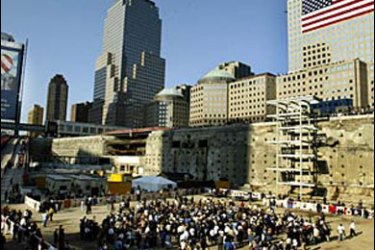 afp - Family members of the victims gather a ceremony to marking the second anniversary of September 11 terrorist attack at World Trade Center site in New York City 11 September 2003