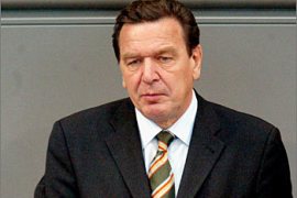 German Chancellor Gerhard Schroeder speaks to the lower house of parliament, the Bundestag, in Berlin, 25 September 2003. Addressing parliament after returning from the UN General Assembly in New York, he said there was growing support for an expansion of the mandate beyond the Afghan capital Kabul. AFP PHOTO/DDP JOHANNES EISELE GERMANY OUT
