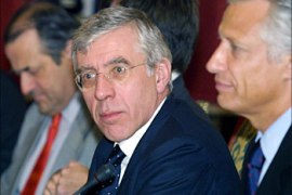 British foreign minister Jack Straw looks over during a meeting with Iranian officials and the French and German foreign ministers in the Saad Abad palace in Tehran 21 October 2003. Britain, France and Germany told Iran to show "full transparency" over its suspect nuclear programme, warning of a "serious problem" if their foreign ministers ended their unprecedented visit to Tehran without a deal on the crisis.