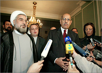 Iranian Hassan Rohani (L), the secretary of the Islamic Rpeublic's Supreme Council on National Security, and Mohamed el-Baradei, director of the International Atomic Energy Agency (IAEA), speak to journalists after holding talks in Tehran 16 October 2003. El-Baradei said Iran has expressed its "readiness" to sign the additional protocol to the nuclear Non-Proliferation Treaty (NPT) allowing tougher UN inspections of its nuclear facilities. AFP PHOTO/ATTA KENARE