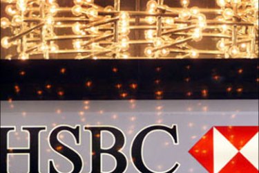 (FILES) Lights glitter in the lobby of the London headquarters of HSBC Holdings 25 February 2000