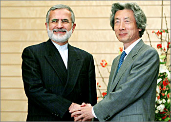 Iranian Foreign Minister Kamal Kharrazi (L) meets with Japanese Prime Minister Junichiro Koizumi at the start of talks at the premier's official residence in Tokyo November 14, 2003. REUTERS/Eriko Sugita
