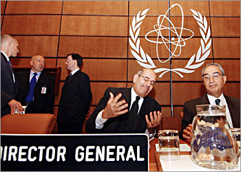 International Atomic Energy Agency (IAEA) Director General Mohammed El Baradai (C) gestures as he speaks during the IAEA Board of Governors Conference at the IAEA headquarters in Vienna 20 November 2003.The head of the UN nuclear watchdog said again that inspections to be carried out in Iran would be decisive for verifying allegations that Theran is secretly developing nuclear weapons. AFP PHOTO JOE KLAMAR