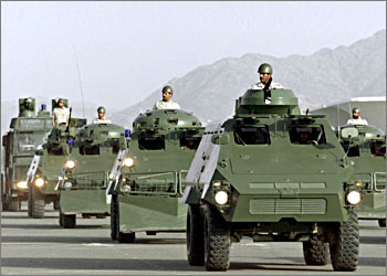 (FILES) -- This file picture dated 12 March 2000 shows Saudi police from the Hajj special parading in armored vehicles during a ceremony attended by Saudi Interior Minister Prince Nayef bin Abdul Aziz in the Muslim holy city of Mecca. Saudi security forces shot dead two militants in a clash in Mecca 03 November 2003, the interior ministry said. But a London-based opposition figure told AFP that the casualties among militants and security forces were a lot higher. Saudi authorities surrounded the suspects, at which point the militants opened fire with machine-guns and hand grenades, and security sources responded, the official added. AFP PHOTO/Marwan NAAMANI