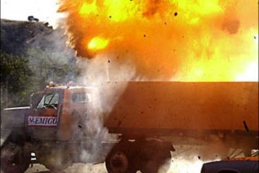 r: A truck burns in a simulated terrorist attack during a security drill on the U.S.-Mexican border in Nogales, Arizona