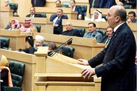f: Jordanian Prime Minister Faisal al-Fayez delivers a speech during a parliamentary session to approve the policy agenda of the government