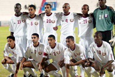 The Qatari soccer team poses before their match against Bahrain at the Gulf Cup tournament in Kuwait