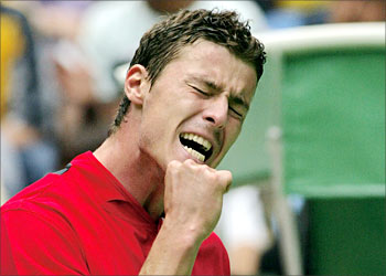 Marat Safin of Russia celebrates winning a point during his men's singles fourth round match against James Blake of the US at the Australian Open in Melbourne, 25 January 2004. Safin won 7-6 (7/3), 6-3, 6-7 (6/8), 6-3. AFP PHOTO/William WEST