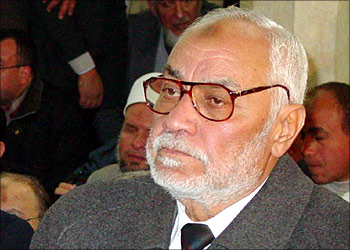 File picture dated 05 January 2004 shows the new spiritual guide of Egypt's Muslim Brotherhood Mohamed Mehdi Akef during the funeral of a party member in Cairo. Akef has called on the Egyptian government to open a political dialogue with his banned but tolerated group, in an interview published 16 January 2004. Akef charged in the interview with the London-based Arab newspaper Al-Hayat that the government was "causing the tension" because it has entrusted the file of the Muslim Brotherhood to the security services