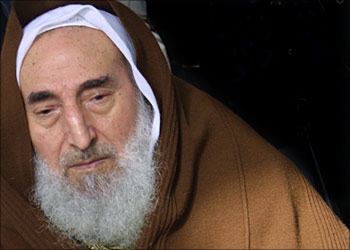 Hamas spiritual leader Sheikh Ahmed Yassin attends the weekly Friday prayer at Al-Mojammaa mosque in Gaza City 16 January 2004. Israel's deputy defense minister said that Sheikh Yassin, spiritual leader of the radical Palestinian Islamic group Hamas, "deserves to die," army radio reported 16 January 2004. Zeev Boin said the sheikh "deserves to die, and I would advise him to go underground," the radio reported. Sheikh Yassin has already been unsuccessfully targeted by Israel's army. Hamas claimed this week's suicide bombing at Erez crossing point between Gaza and Israel in which four Israelis were killed.
