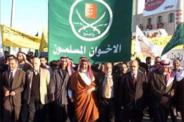 f: Members of Jordan's Muslim Brotherhood group lead a demonstration by around 600 people in the Jordanian capital Amman 09 February 2004