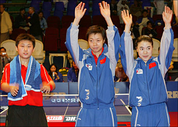 The Women’s World Champions from China, from left GUO Yue, ZHANG Yining and WANG Nan copy