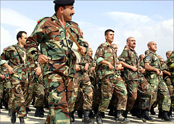 F_Some 153 former Peshmerga fighters, preparing to join Iraq's US-trained new army, take part in a training session in Chulan, 60 kms north of Suleimaniya in northern Iraq, 14 March 2004. The 375,000-strong Iraqi army was disbanded by the US-led coalition, which aims to build a new defense force totaling 40,000 infantrymen by the end of this year. Chulan is situated in the Kurdish mountains, 390 kms north of Baghdad. AFP PHOTO/Marwan IBRAHIM