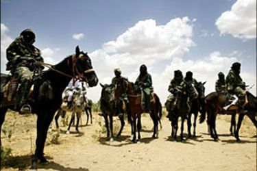 afp - Sudanese Jiinjaweed fighter and militia ride on their horses in Sudan's western Darfur region near the Chadian border,