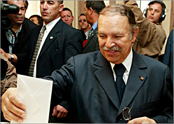 Outgoing Algerian President Abdelaziz Bouteflika casts his vote in a polling station in Algiers April 8, 2004. Algeria goes to the polls to elect a new president today, likely to mark a turning point for an emerging democracy. The country is coming out of a civil war which cost an estimated 150,000 deaths, mostly civilians at the hands of Islamic rebels fighting a holy war. REUTERS/Jack Dabaghian