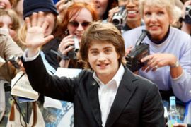 Actor Daniel Radcliffe who plays Harry Potter waves to the crowd as he arrives at the premiere for the latest Harry Potter Film, the Prisoner of Azkaban at Leicester Square, London U.K.