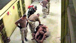 F_Digital photograph obtained by The Washington Post, and released 06 May 2004, shows detainees at the Abu Ghraib prison