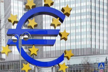 f/A file photo taken 08 January 2004 shows a man walking past a Euro-symbol in front of the European Central Bank (ECB) in Frankfurt/Main, western Germany. The ECB upgraded on 02 September 2004