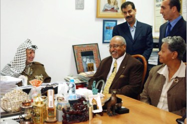 AFP - Palestinian leader Yasser Arafat meets a delegation of the Seeds of Peace organization headed by Tom Wilson (C) 23