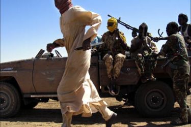 F_Sudan's Liberation Army rebels patrol in their base at an undisclosed location in North Darfur, Sudan, during
