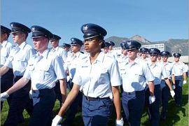 AFP - This 13 August, 2004 US Air Force file image shows a female cadet(C) marching in formation with male cadets
