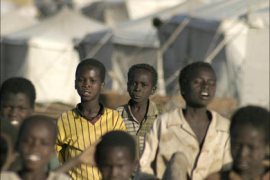 f_Sudanese displaced children gather outside their tents in El-Sereif camp near Nyala town in Sudan's southern