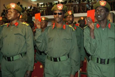 afp - Sudanese officers from the pro-government South Sudan Defense Forces take the oath of allegiance as part of the integrating process of 182 officers