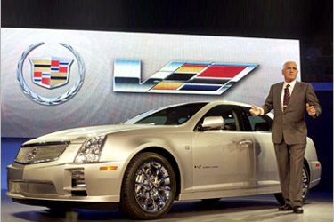 AFP - General Motors Vice Chairman Bob Lutz introduces the new 2006 Cadillac STS-V, during the North American International
