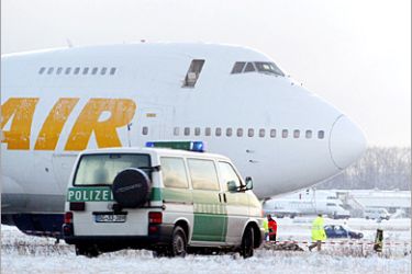 AFP - A damaged Air Atlas 747-200 freight aircraft that plowed into the runway in snowy weather sits at Duesseldorf airport 24