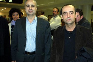 Ibrahim Farhat (L) of Hezbollah welcomes 11 January 2005 the head of Paris-based press watchdog Reporters Without Borders (RSF), Robert Menard (R),