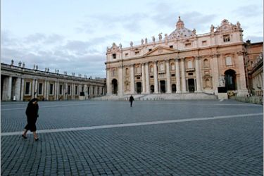 AFP - A nun walks in St. Peter's Square at the Vatican early 03 February 2005. Pope John Paul II spent a second night at the