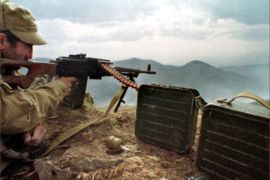 This picture dated April 1993, shows Armenian soldier, aiming at his position at a frontline with Azrbaijan troops not far from the town of Hadrut, Nagorny Karabakh