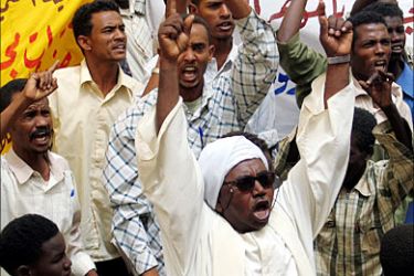 r_Sudanese students chant during a protest in the streets of the Sudanese capital