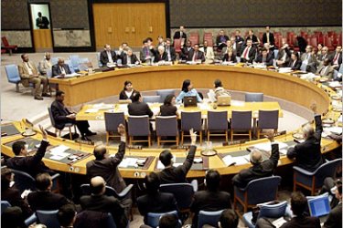 . AFP - The United Nations Security Council votes 11-0 with 4 abstentions, 31 March, 2005, at UN headquarters in New York to pass a resolution sponsored by France that proposes