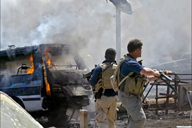 f_Foregin securtiy security contractors secure that area where a car bomb