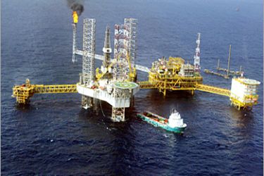AFP - View of a Total Nigeria offshore oil and gas production platform at Amenam in the Niger delta 18 May 2005. French Trade Minister Francois Loos visited southern Nigeria's oil-