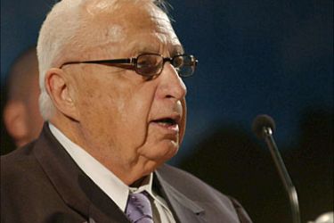 f_Israeli Prime Minister Ariel Sharon addresses a commermoration ceremony for