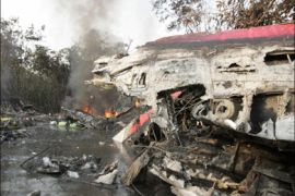 afp - Part of the wreckage of the TANS Peru Airlines plane crashed Tuesday is still ablaze 24 August, 2005 in Pucallpa, Peru. Rescuers scoured the Amazon jungle