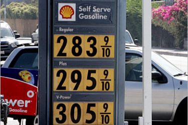 REUTERS /Prices for premium gasoline have reached $3.05 per gallon as indicated on signage at this Shell Oil service station in Hollywood, California August 11, 2005. Oil charged to a