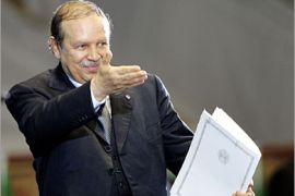 AFP / Algeria's President Abdelaziz Bouteflika greets his supporters during a rally in Algiers, 26 September 2005. Bouteflika gave a speech as a part of his campaign for the