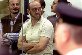 afp/The Syrian head of a Spanish-based Al-Qaeda cell, Imad Eddin Barakat Yarkas, alias Abu Dahdah (C) sits in court as he and 23 others await the verdict in Europe's biggest Al-Qaeda trial, 26 September 2005 in Madrid.