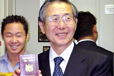 AFP - Handout picture released by FUJIPRENSA agency of former Peruvian President Alberto Fujimori showing his Peruvian passport in Tokio, Japan, 13 September 2005. Peru's